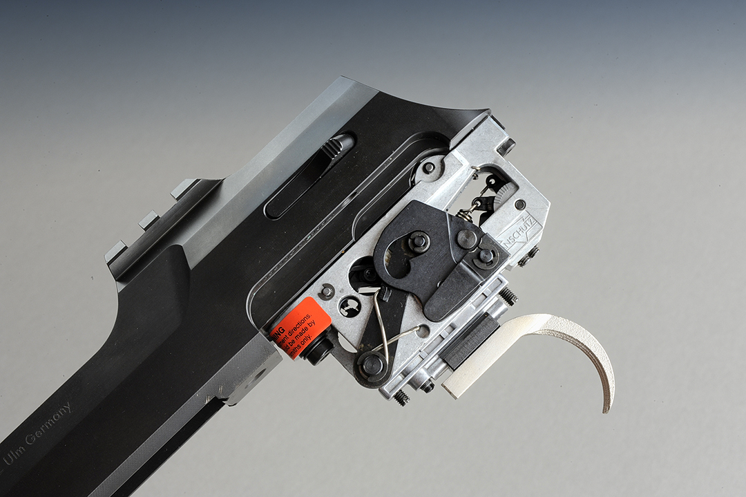 The trigger assembly is comprised of 50 parts and is finely adjustable to your shooting needs. Out of the box from the factory, it measured around 14 ounces with no take up before the sear broke. Installed on the gun, it is a single-stage trigger, but can be modified to operate as a two-stage trigger.